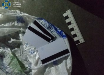 Двое харьковчан по наводке россиянина похищали деньги с банковских карточек (ФОТО)